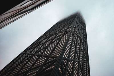 Low angle view of modern building against sky
