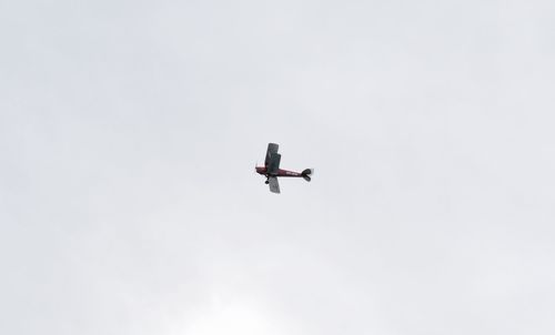 Helicopter flying over clear sky