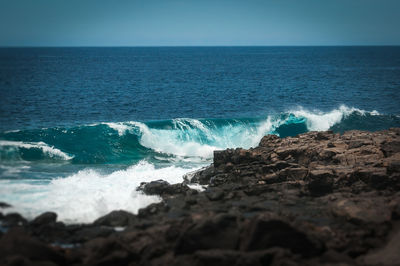 Scenic view of sea against clear sky