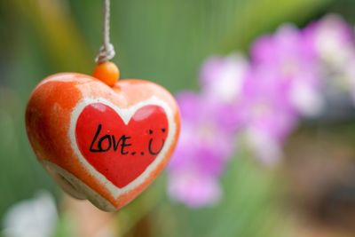 Close-up of heart shape made hanging