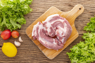 High angle view of chopped vegetables on cutting board