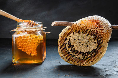 Close-up of drink in glass jar on table