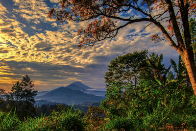 Scenic view of mountains against sky during sunset