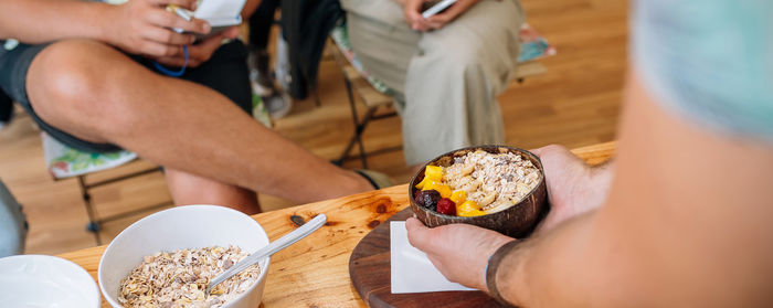 Midsection of woman holding food