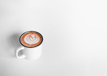 Coffee cup against white background