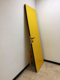 Close-up of yellow door