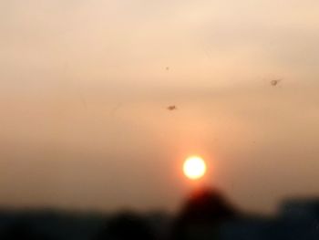 Close-up of sun against sky during sunset