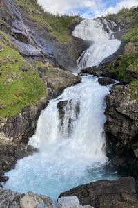 Scenic view of waterfall in forest