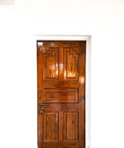 Closed wooden door of house