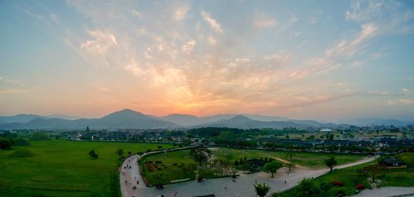 High angle view of city against sky during sunset