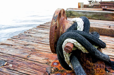 Close-up of rope on pier