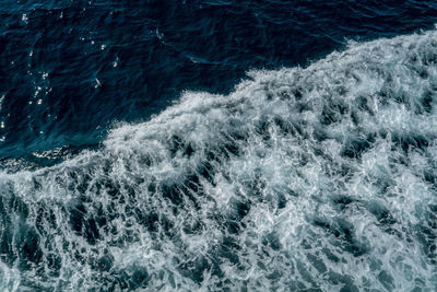 High angle view of surf in sea