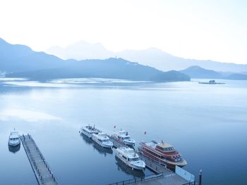 High angle view of ships in sea against sky