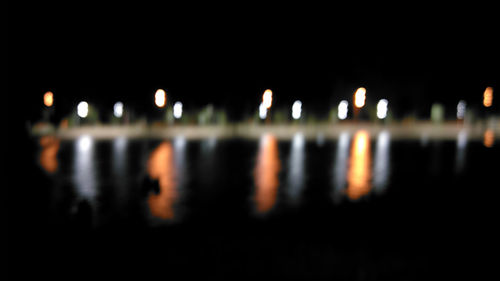 Defocused image of illuminated lights at night