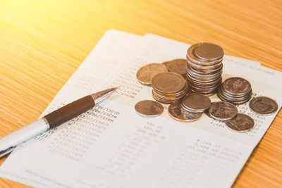 High angle view of coins on table