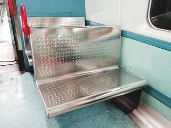 High angle view of empty seats in train