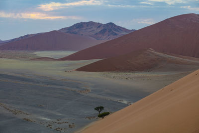 Scenic view of desert against sky