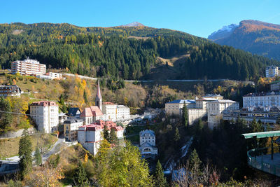 High angle view of townscape and trees against sky