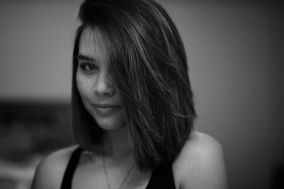 Close-up portrait of a smiling young woman