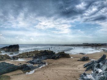 Scenic view of beach against sky