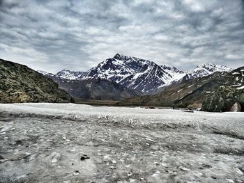 Scenic view of snowcapped mountains against sky