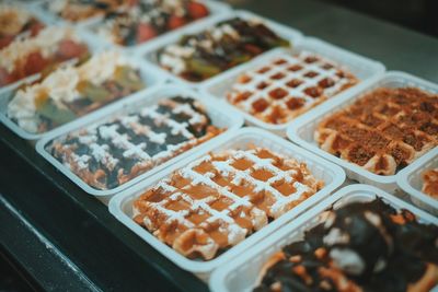 High angle view of waffles displayed at bakery