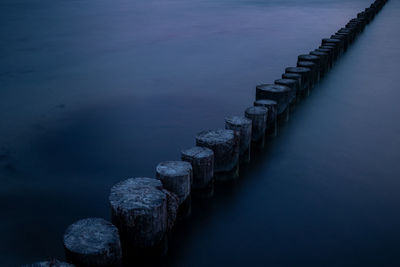 High angle view of groyne in sea