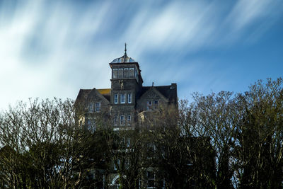 Low angle view of old building against sky