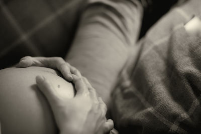 Close-up of baby sleeping on bed