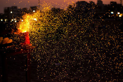 Close-up of firework display at night