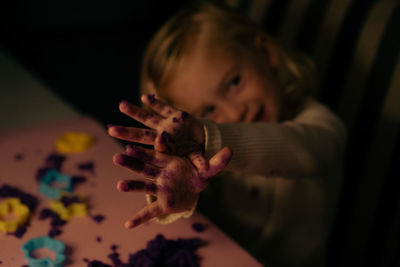 Cute girl playing with toy