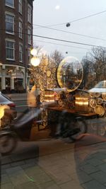 Illuminated city street at night