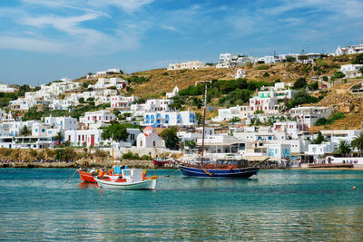 Mykonos port with fishing boats and yachts and vessels, greece