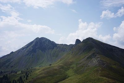 Scenic view of col di lana mountain against sky