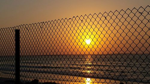 Fence seen through chainlink fence