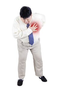 Full length of man standing against white background