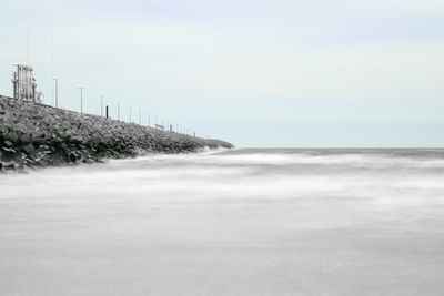 Scenic view of sea against clear sky