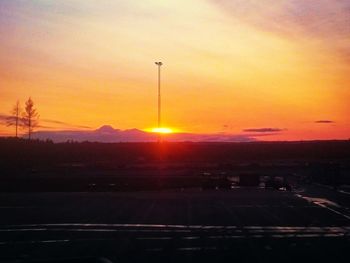 Scenic view of sunset over city