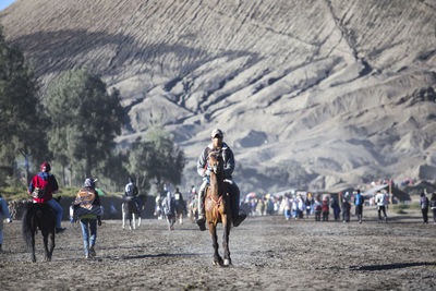 People riding horses