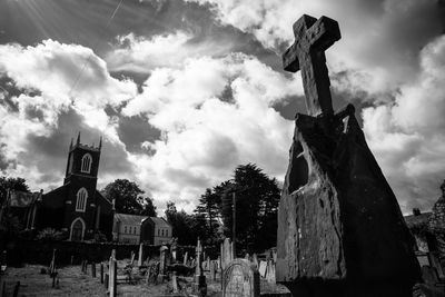 Low angle view of cemetery against sky