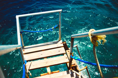 High angle view of steps over sea