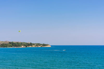 Scenic view of sea against clear sky