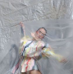 Woman seen through plastic