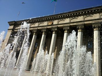 Fountain in front of building