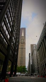 Low angle view of skyscrapers against sky