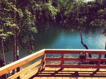 High angle view of footbridge over lake