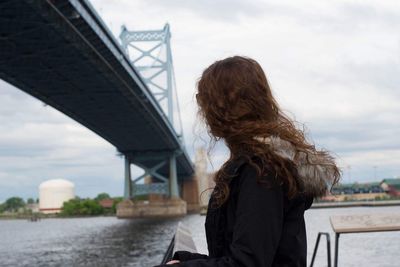 Woman looking at view of city