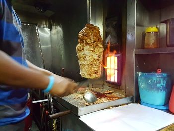 Man preparing food in kitchen
