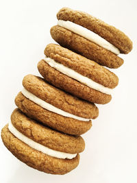 Stack of cookies against white background