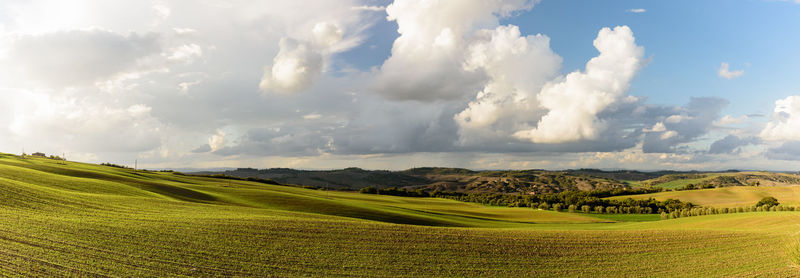 Panoramic view of landscape against cloudy sky